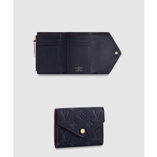 [LOUIS VUITTON-루이비통]가죽 엠보 패턴 동전 카드지갑 중지갑 M64577